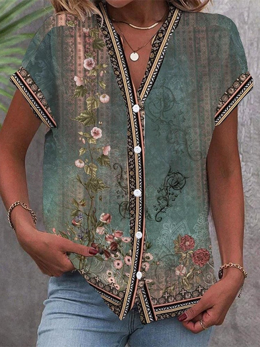 Sage green floral button-front blouse with bohemian trim and short sleeves