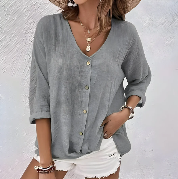Gray textured button-up blouse with V-neck and rolled sleeves, cropped view