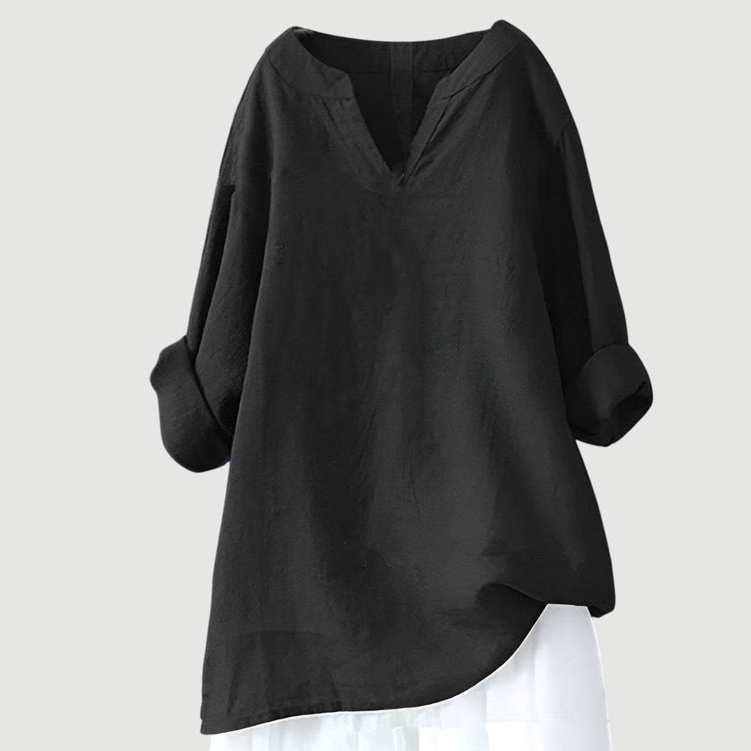 Black linen tunic top with V-neck and rolled sleeve cuffs
