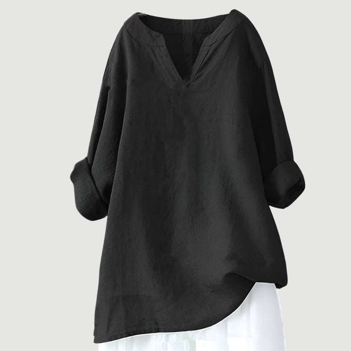 Black linen tunic top with V-neck and rolled sleeve cuffs