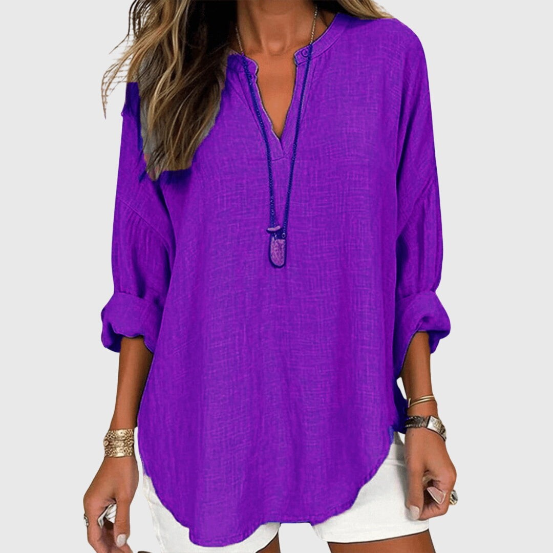 Vibrant purple V-neck blouse with rolled sleeves and relaxed fit