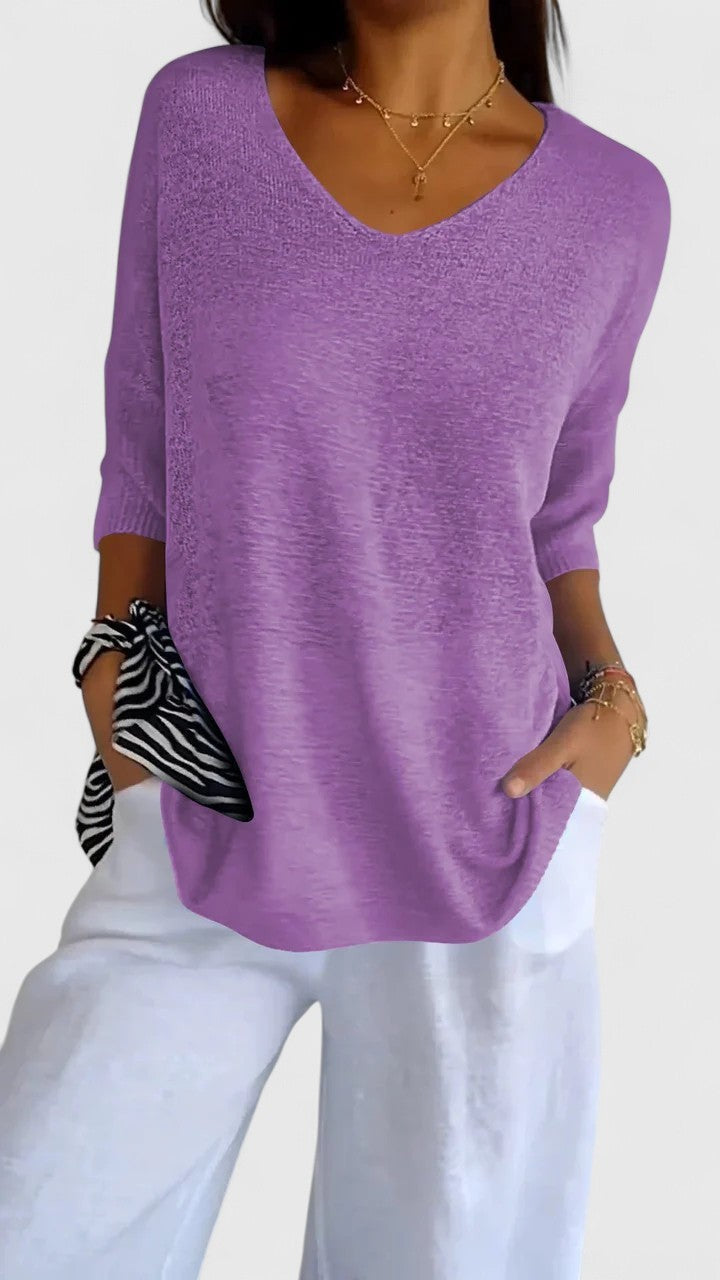 Lavender purple V-neck sweater with loose fit and three-quarter sleeves
