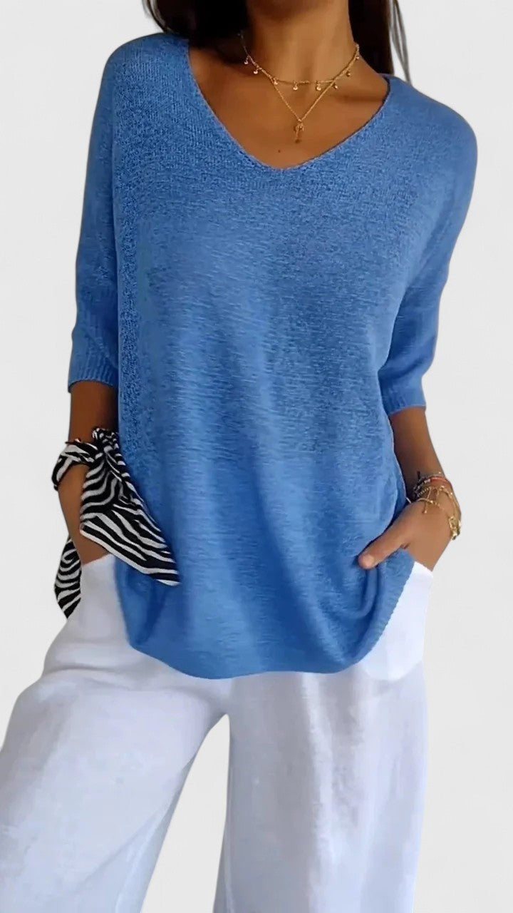 Sky blue V-neck lightweight sweater with three-quarter sleeves, relaxed fit