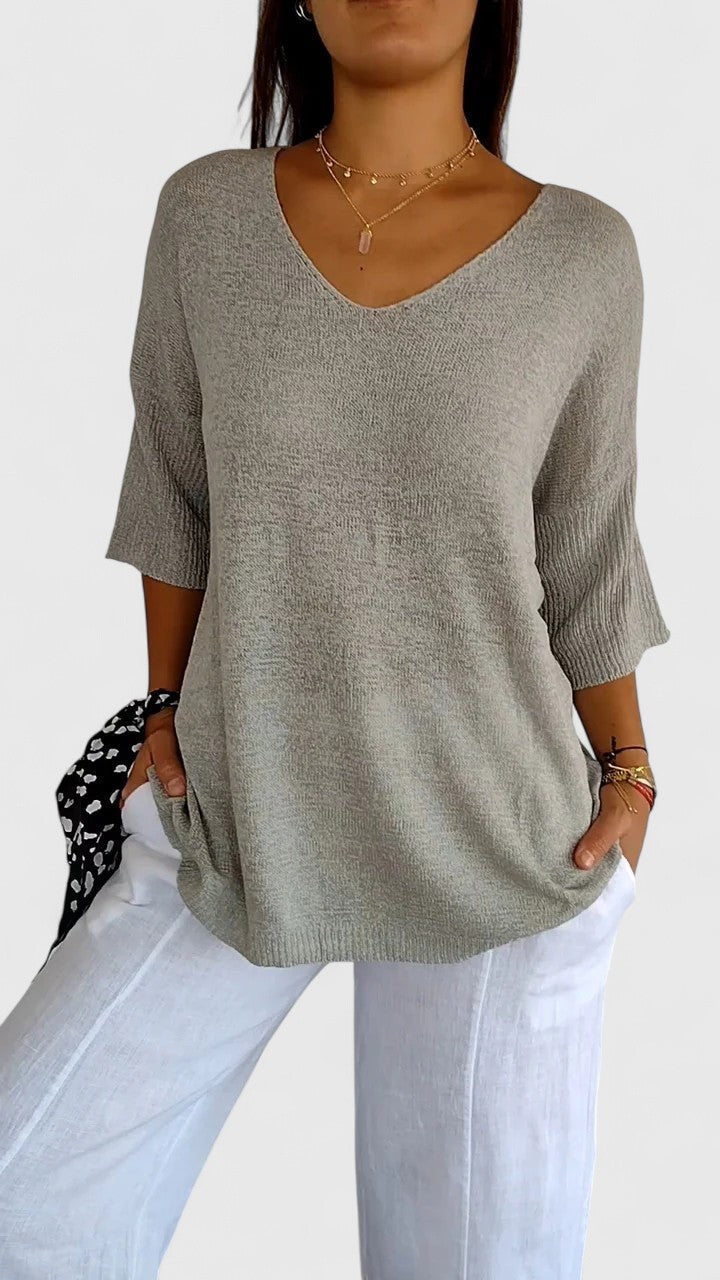 Heather gray V-neck knit top with ribbed three-quarter sleeves, oversized cut