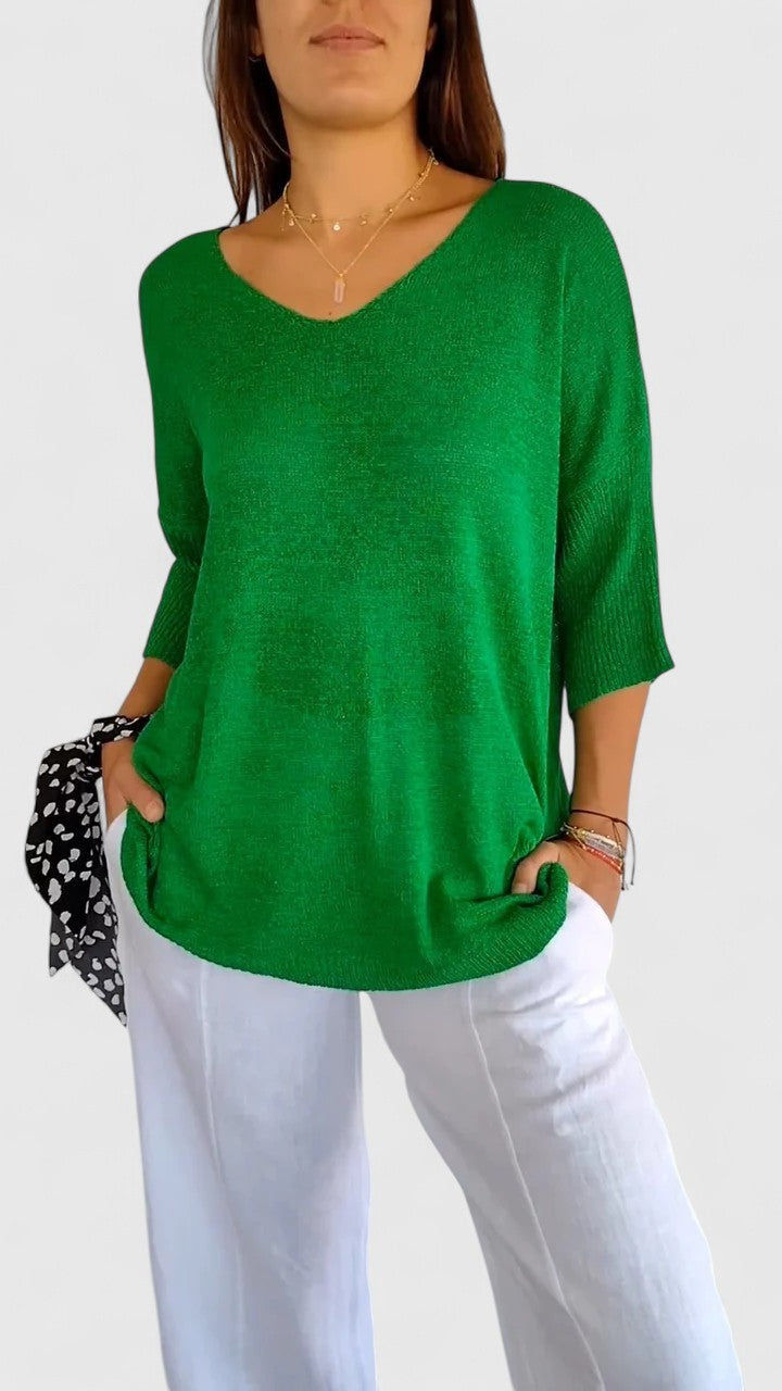 Kelly green V-neck sweater with three-quarter sleeves, loose flowy fit
