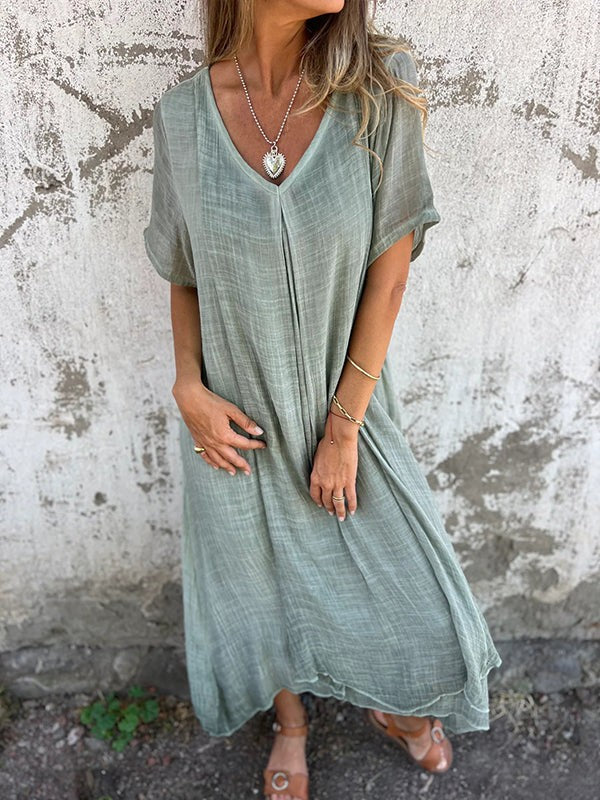 Sage green V-neck maxi dress with short sleeves and loose flowy fit