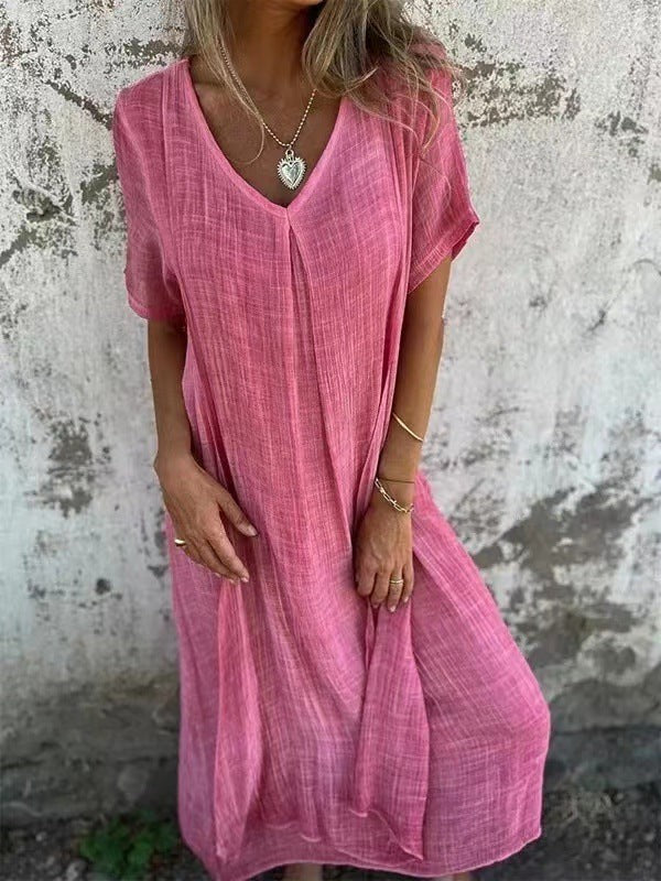 Pink V-neck maxi dress with short sleeves and breezy oversized silhouette