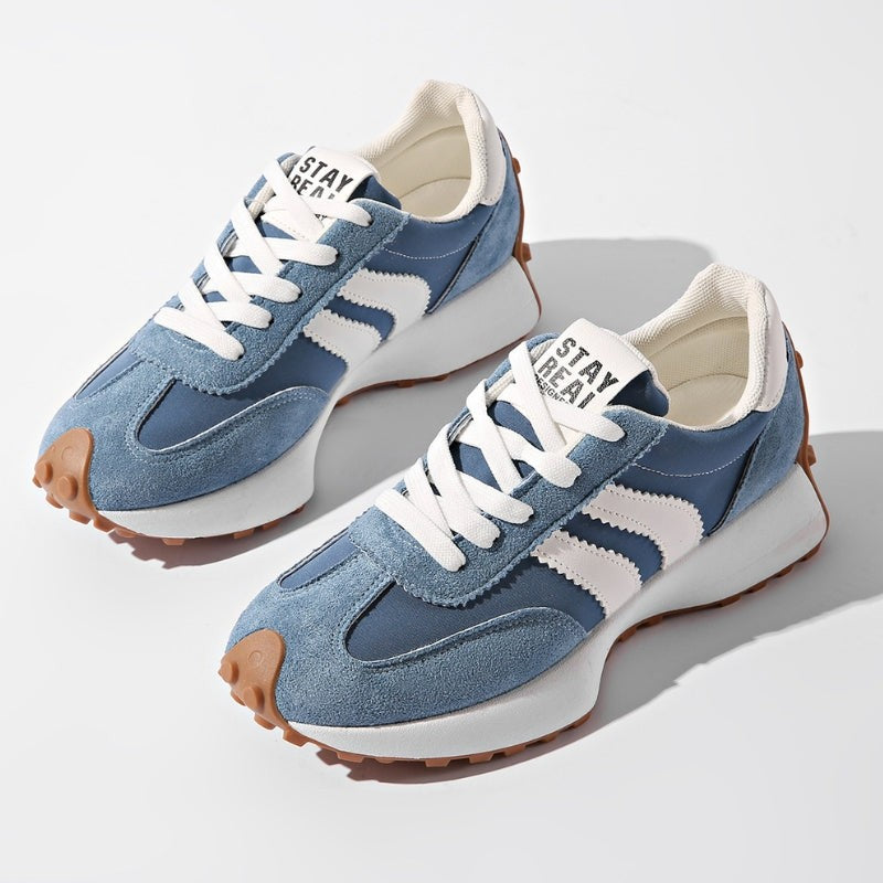 Slate blue retro platform sneakers featuring white stripe details and lace-up front