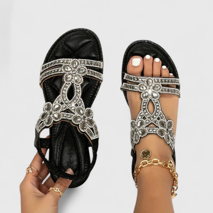 black rhinestone flat sandal with crystal floral T-strap detail