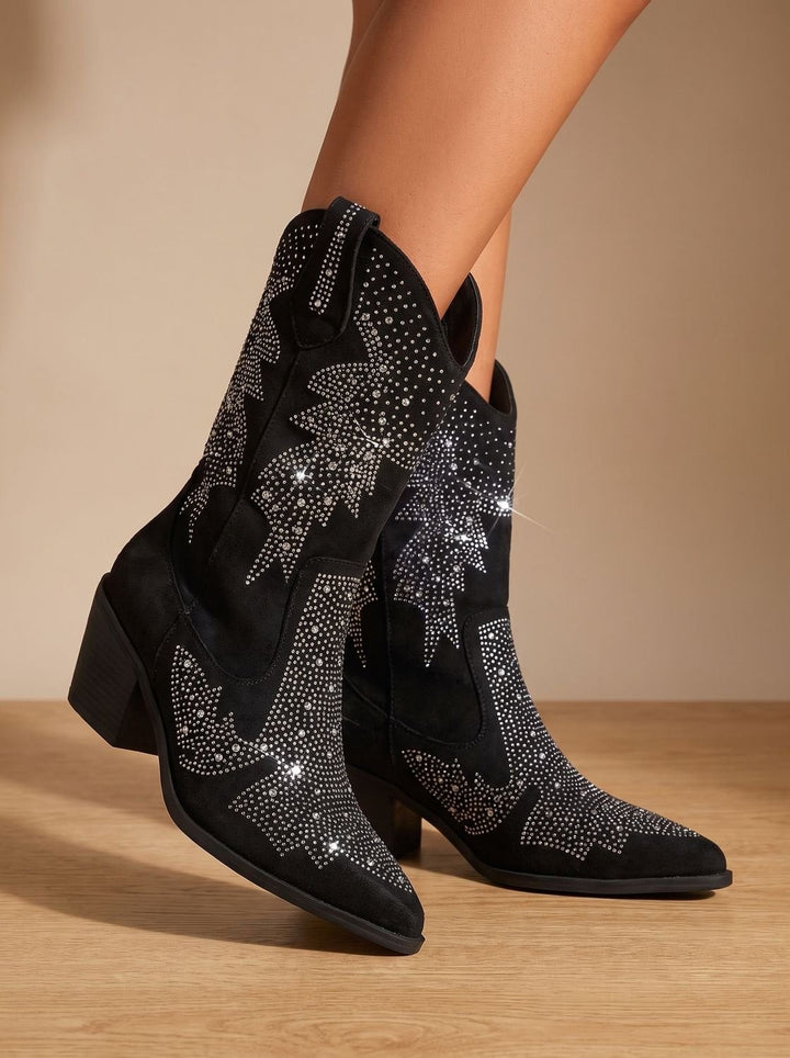 Diamante-studded western boots worn on model, highlighting block heel and pull tabs