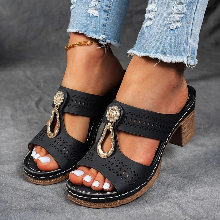 black perforated block-heel sandals with rhinestone T-strap detail