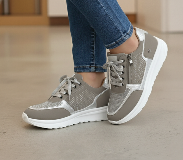 Taupe platform sneakers with metallic silver accents and rhinestone mesh side panel