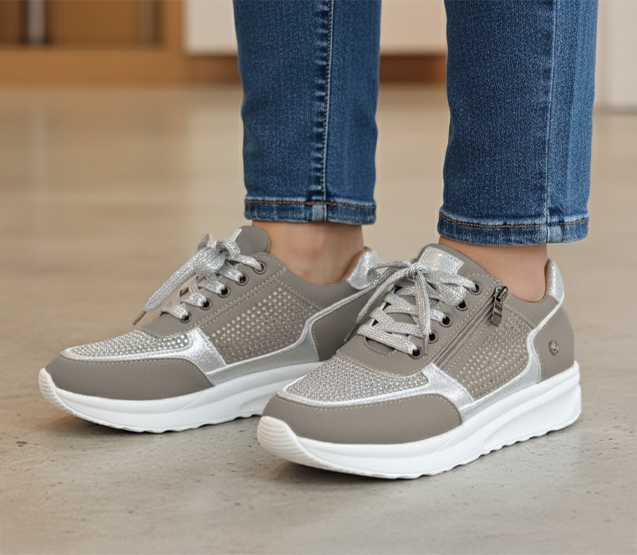 Gray and silver lace-up platform sneakers with studded side panel and zipper closure