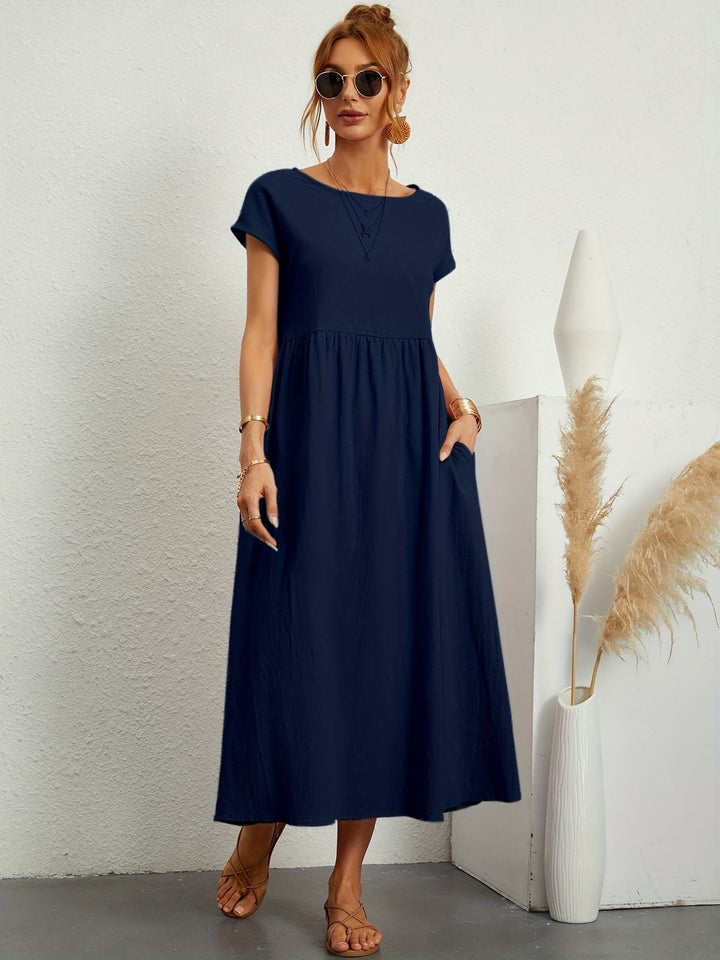 Navy blue maxi dress with cap sleeves and relaxed A-line silhouette