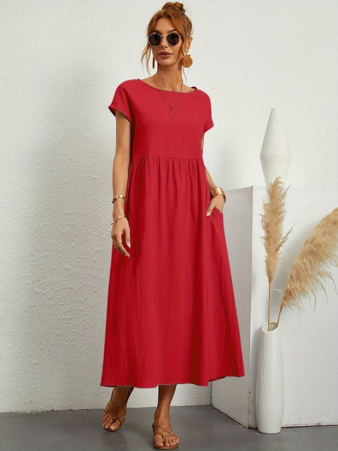 Red maxi dress with cap sleeves and gathered waist, flowy skirt