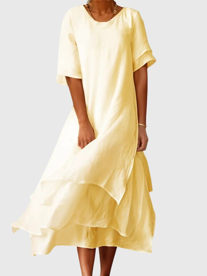 pale yellow tiered maxi dress with ruffled skirt and short sleeves