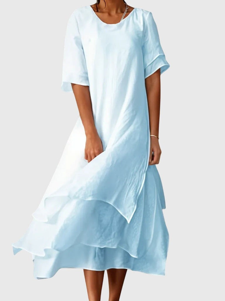 light blue flowy maxi dress with layered ruffle hem detail
