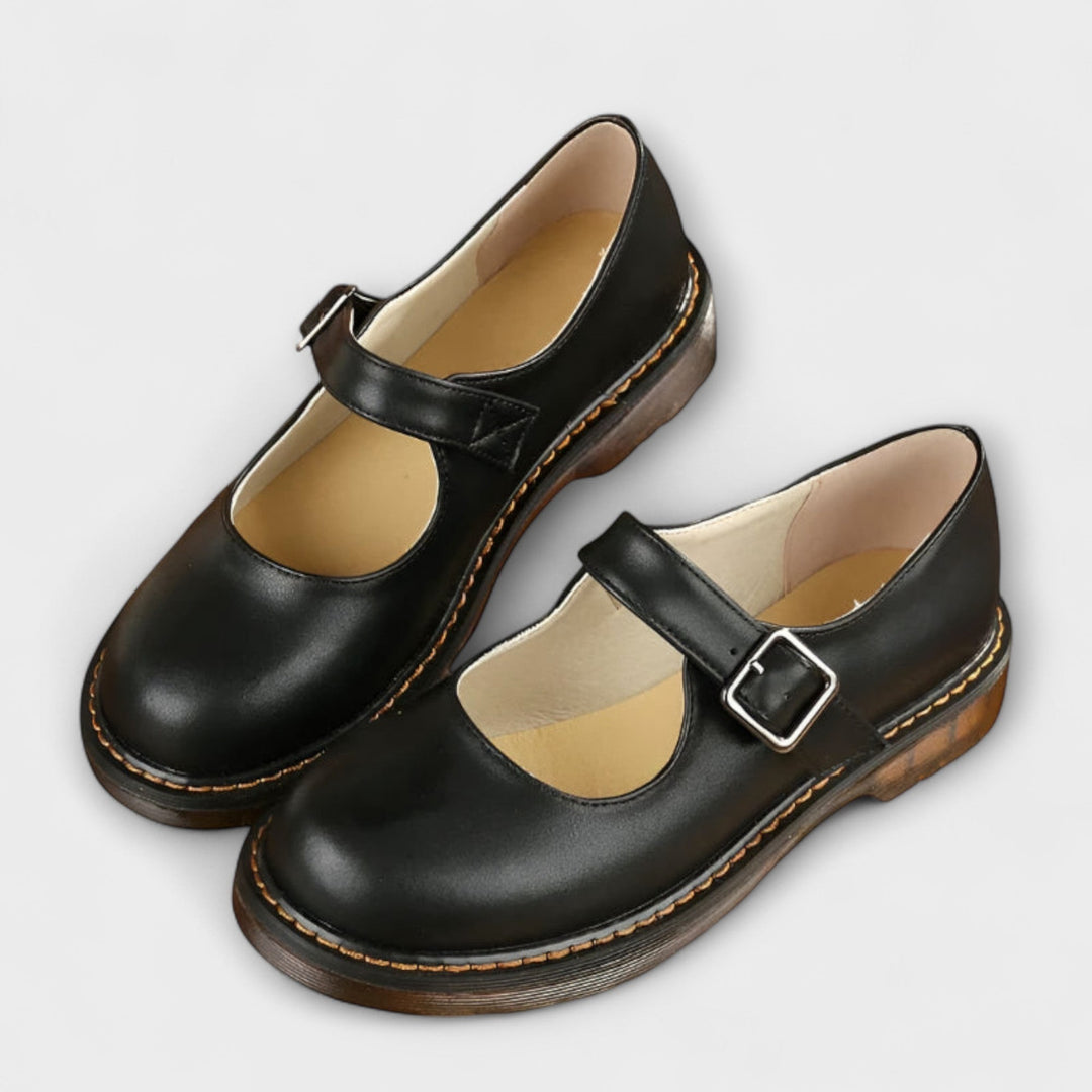 black Mary Jane flats with round toe and adjustable ankle strap