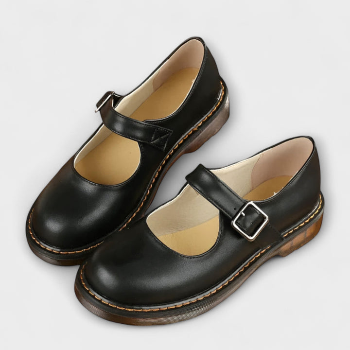 black Mary Jane flats with round toe and adjustable ankle strap