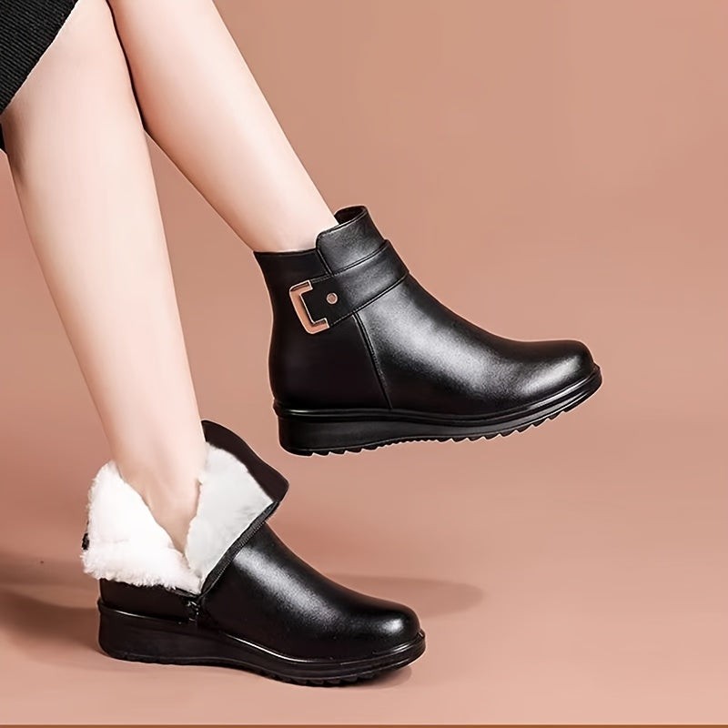 black leather ankle boots with fleece lining paired with a midi skirt
