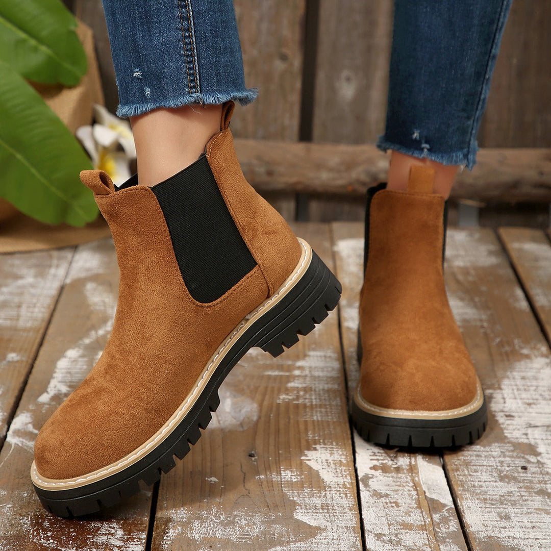 Tan suede Chelsea boots with elastic gusset and durable cleated sole