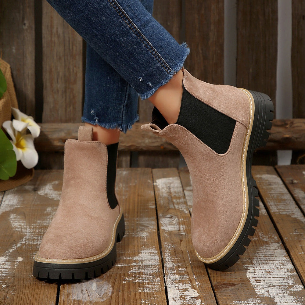 Dusky pink suede Chelsea boots with elastic side panel and cleated sole