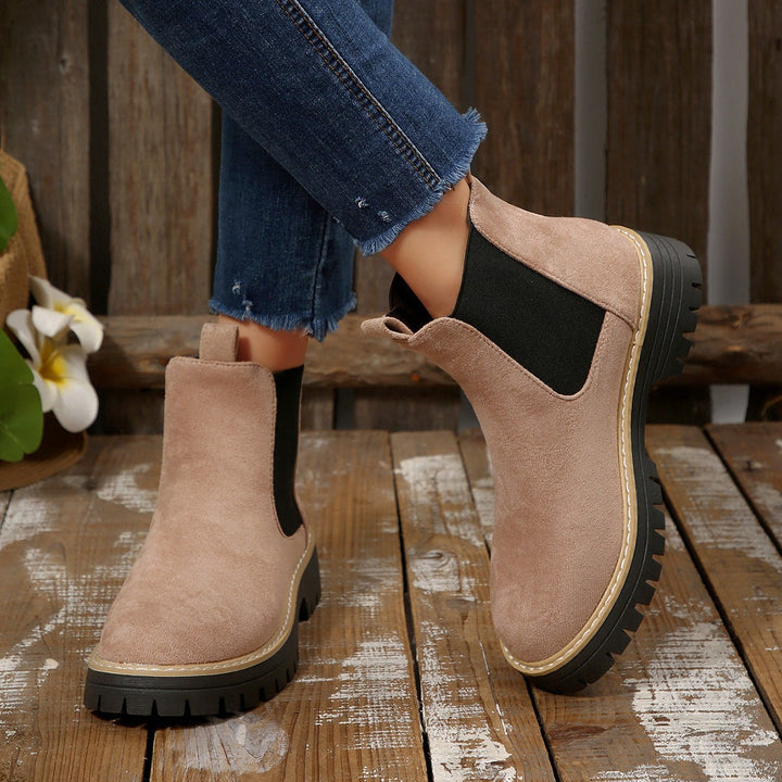 Dusky pink suede Chelsea boots with elastic side panel and cleated sole
