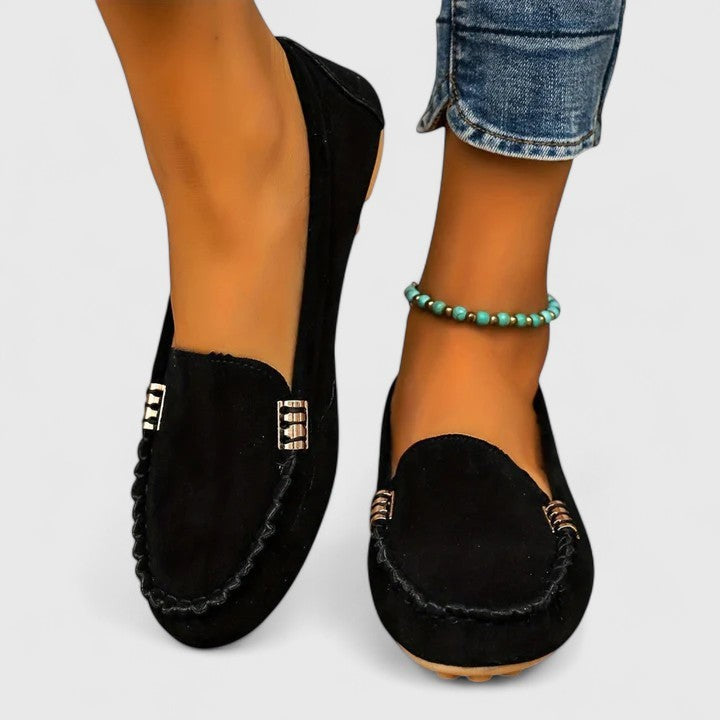 Black suede loafer with braided stitch detail and gold-tone accent