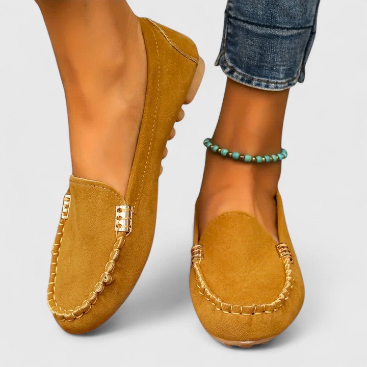 Camel suede slip-on moccasin with stitched apron toe and gold hardware