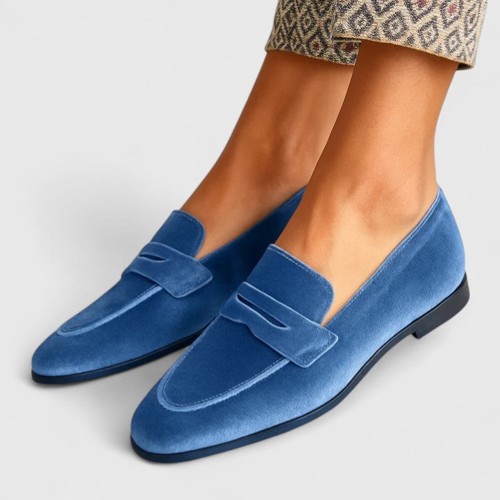 Blue velvet penny loafers with pointed toe and flat sole