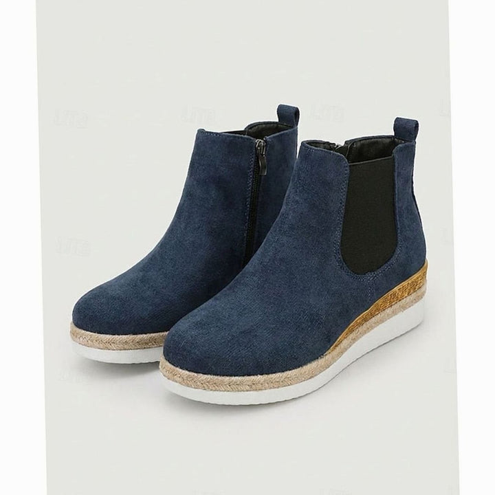 Navy suede wedge Chelsea ankle boots with side zip fastening