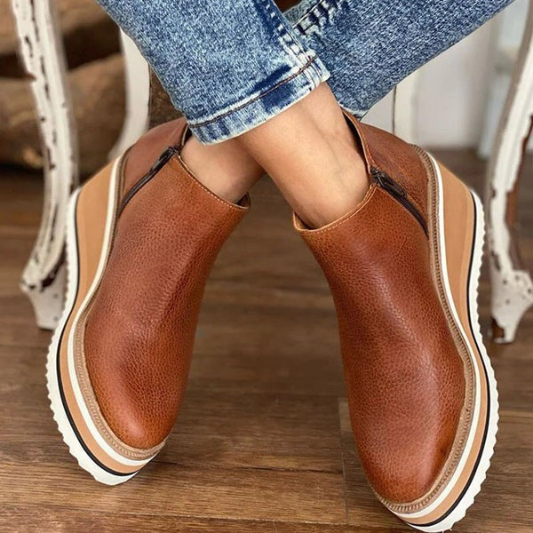 brown leather platform wedge boots with crisscross ankle styling