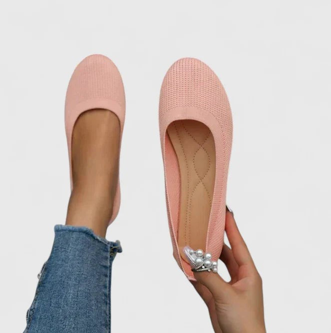 Pink knit ballet flats shown with pearl embellishment accent detail