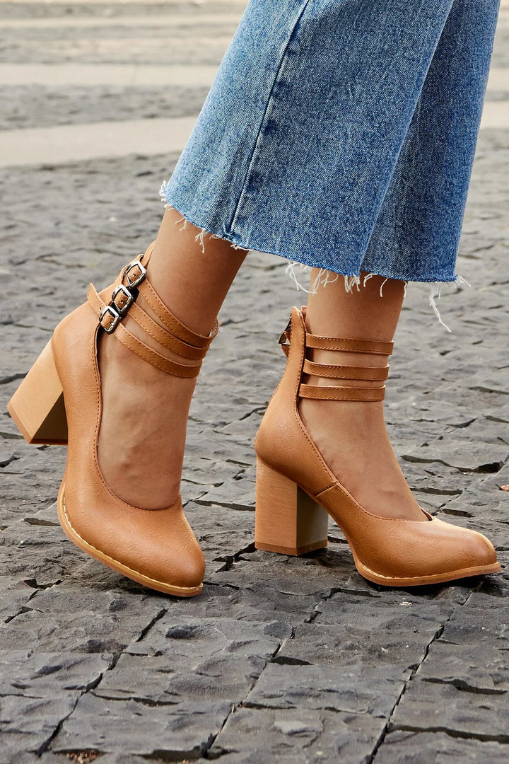Camel leather ankle-strap pumps with triple buckle straps and block heel