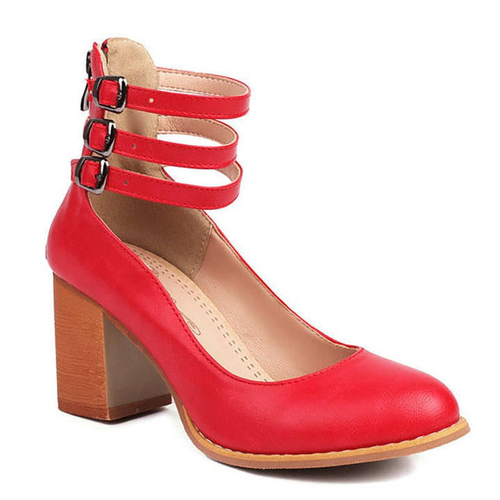 Red leather block-heel pump with triple buckled ankle straps, product angle view