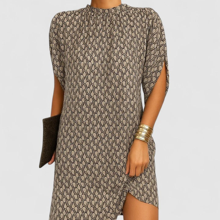 Snake print shift dress with mock neck and asymmetrical curved hem