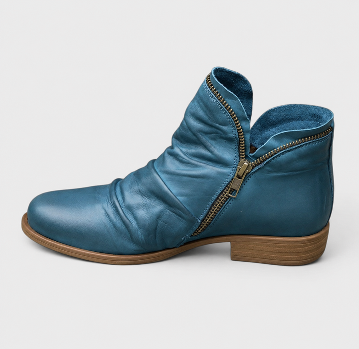 Teal leather ankle boot with ruched leather and brass side zipper