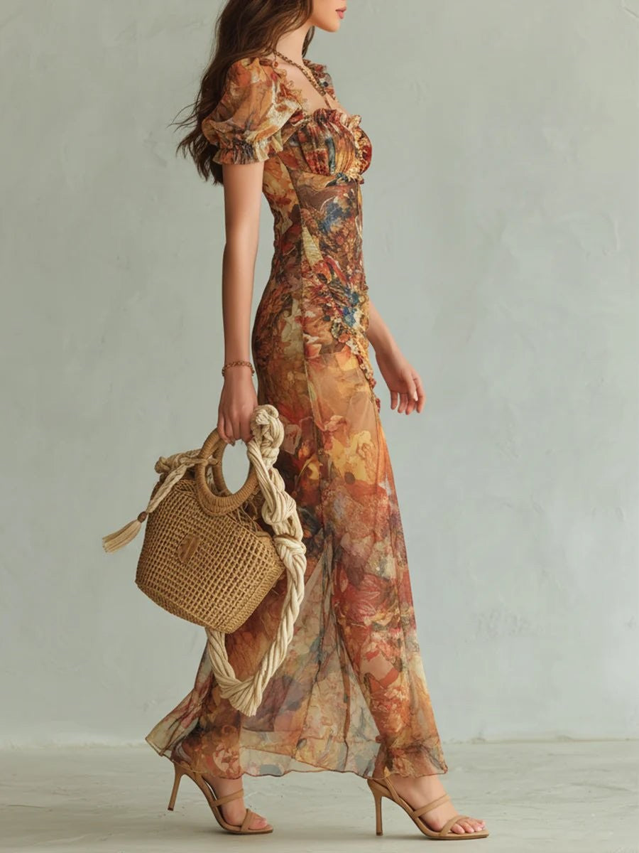 side profile of ruffled chiffon maxi dress with front leg slit