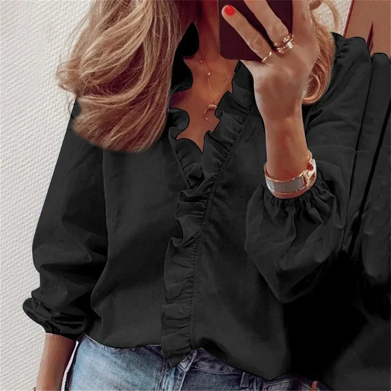 black ruffled V-neck blouse with balloon sleeves