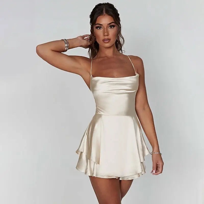 ivory satin cami mini dress featuring pleated bodice and tiered hem