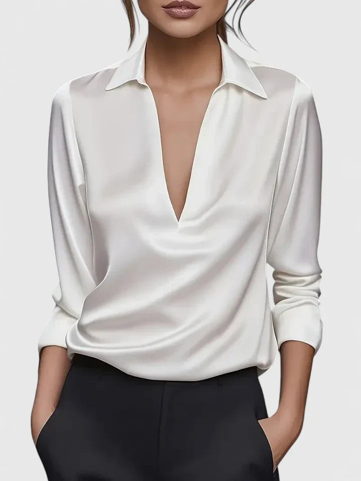 White satin blouse with V-neck collar and long sleeves, draped front detail