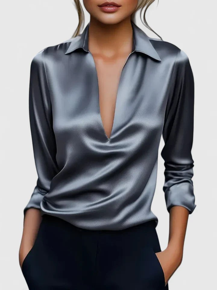 Silver satin blouse with collared V-neck, long sleeves and soft draping