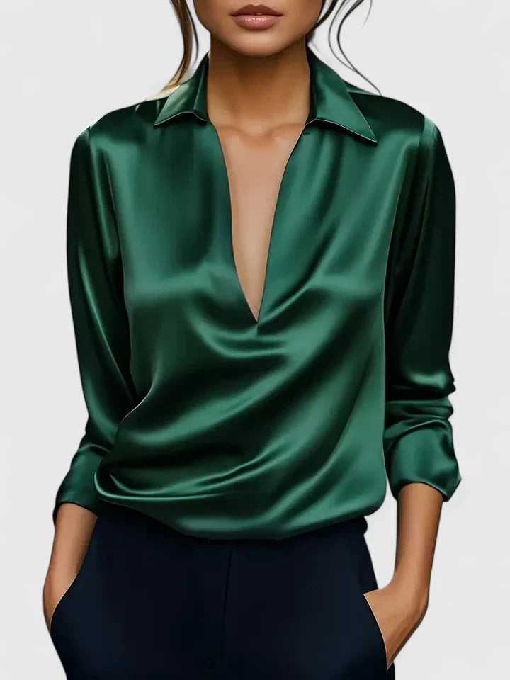 Emerald green satin blouse with V-neck collar, long sleeves and fluid drape