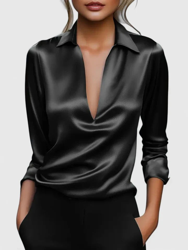 Black satin blouse featuring collared V-neck and long sleeves, glossy finish