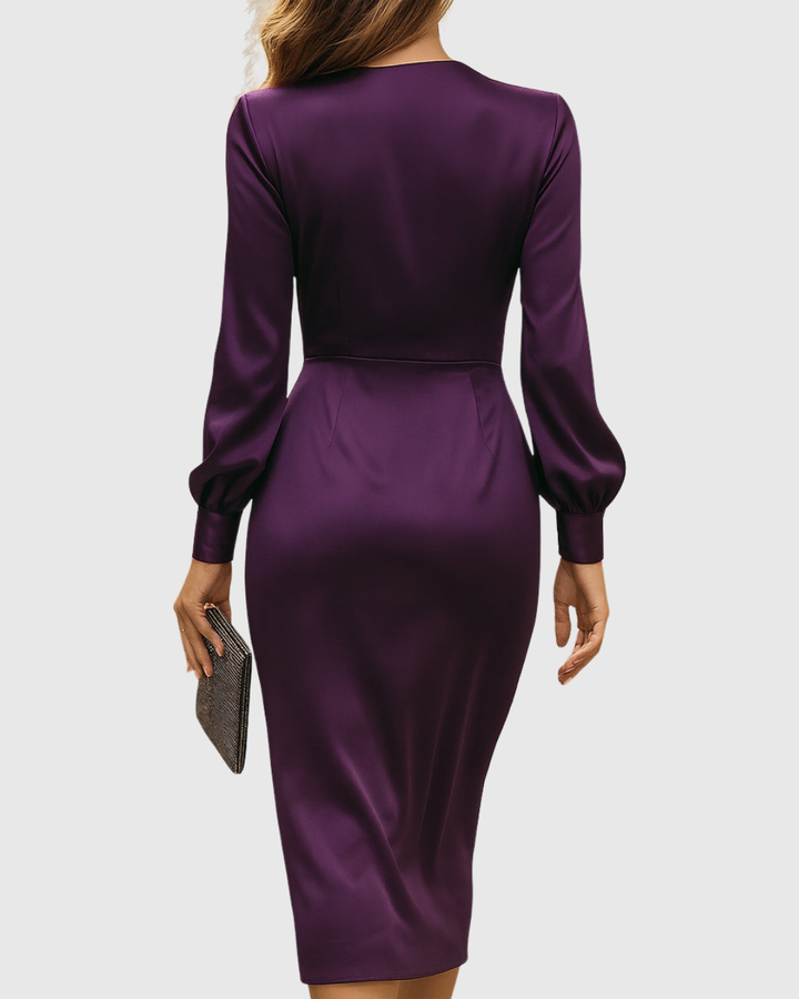 back view of plum satin midi dress with long sleeves and fitted silhouette