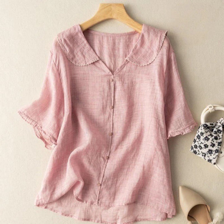 Pink cotton blouse with lace-trimmed Peter Pan collar and button front