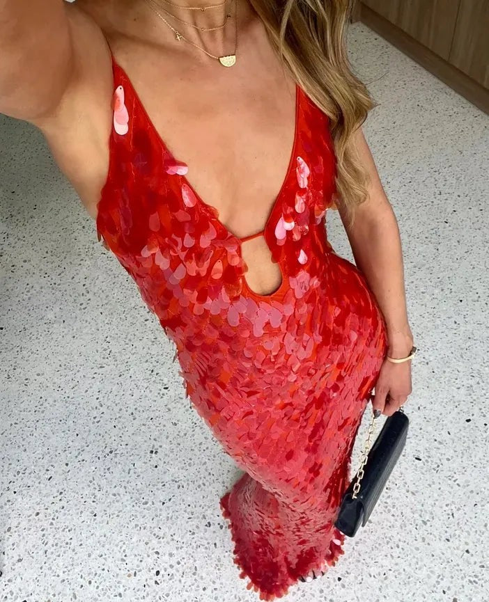 close-up of red sequin dress with keyhole cutout and V-neckline