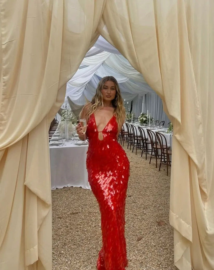 red sequin maxi dress with keyhole front worn at outdoor wedding reception