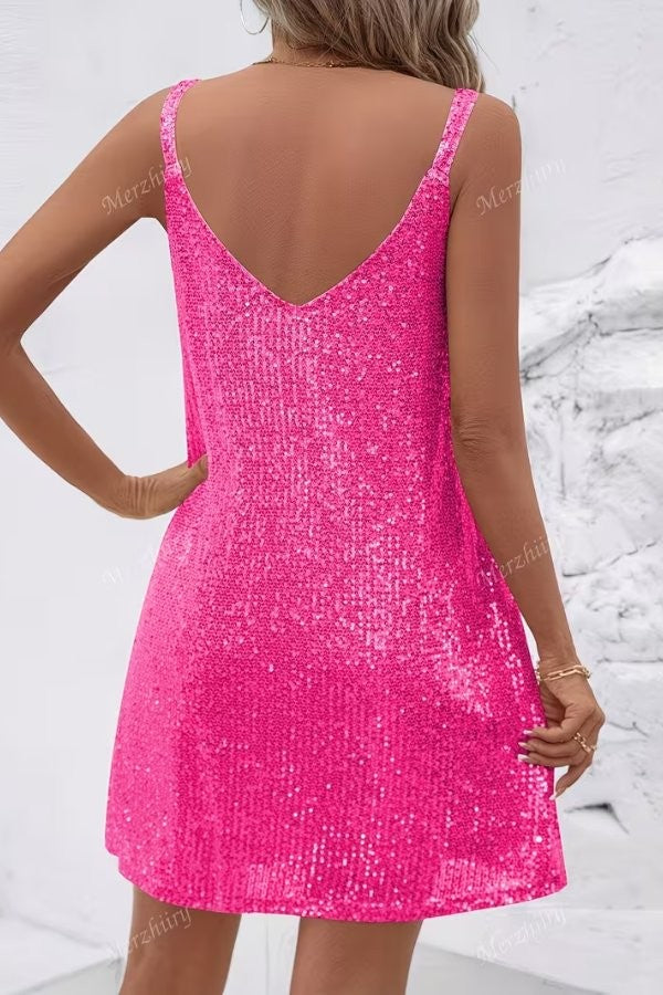 Back view of hot pink sequin mini dress with V-back and thin straps