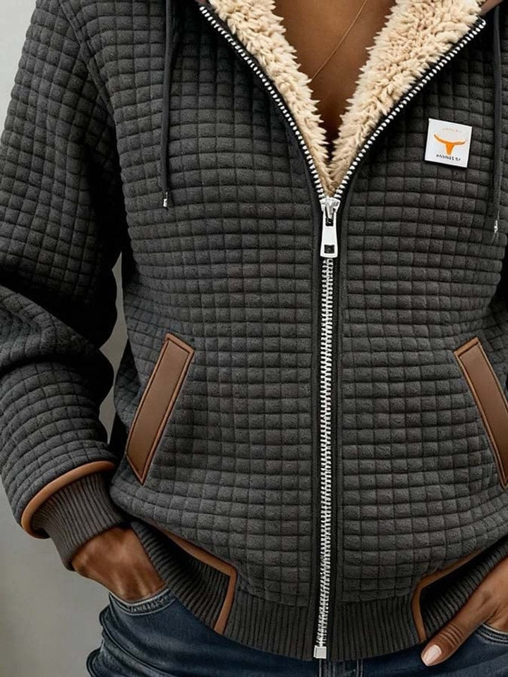 Gray quilted fleece jacket with faux leather pockets and full zipper